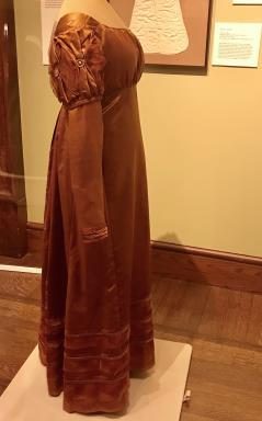 Side view of woman's long-sleeve dress from eighteenth or early nineteenth century